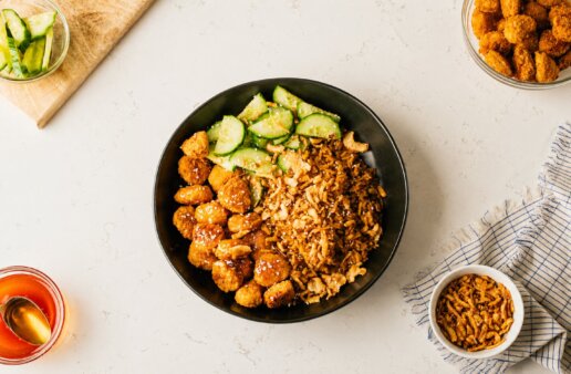 Crispy Chicken Hot Honey Bowl with Cucumber, Crispy Onions & Sesame