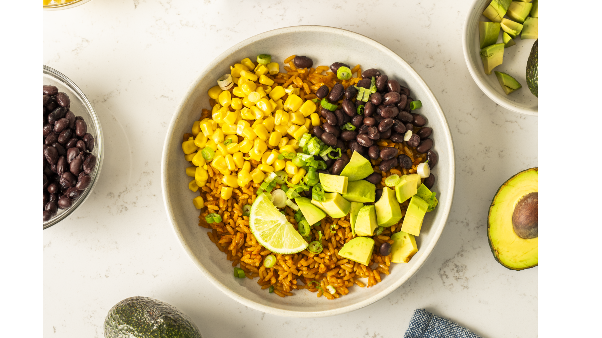 Mexican Rice Bowl with Avocado, Corn, Beans & Lime